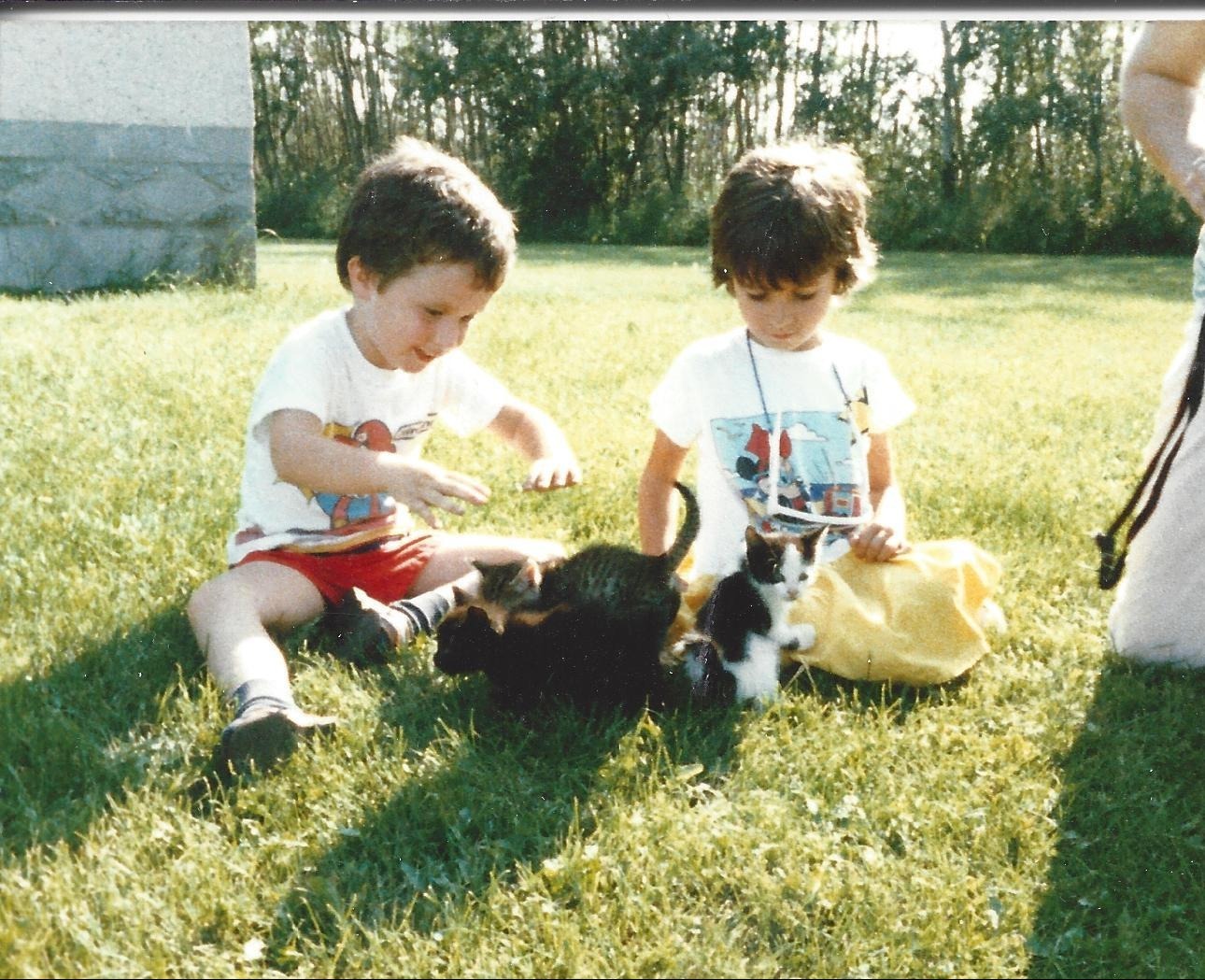 Matthew and Corinne playing with Kittens